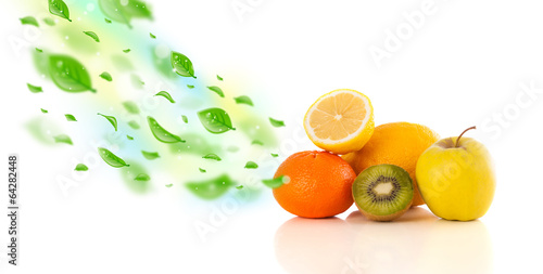 Colorful fruits with green organic leafs