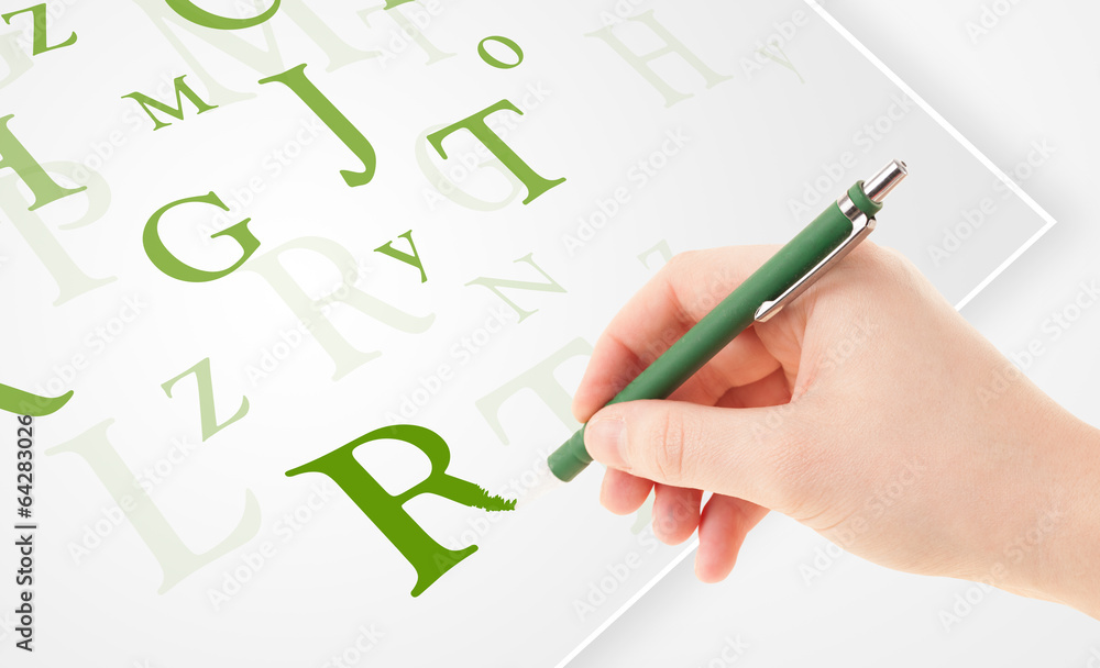 Hand writing various letters on white plain paper Hand writing various letters on white plain paper