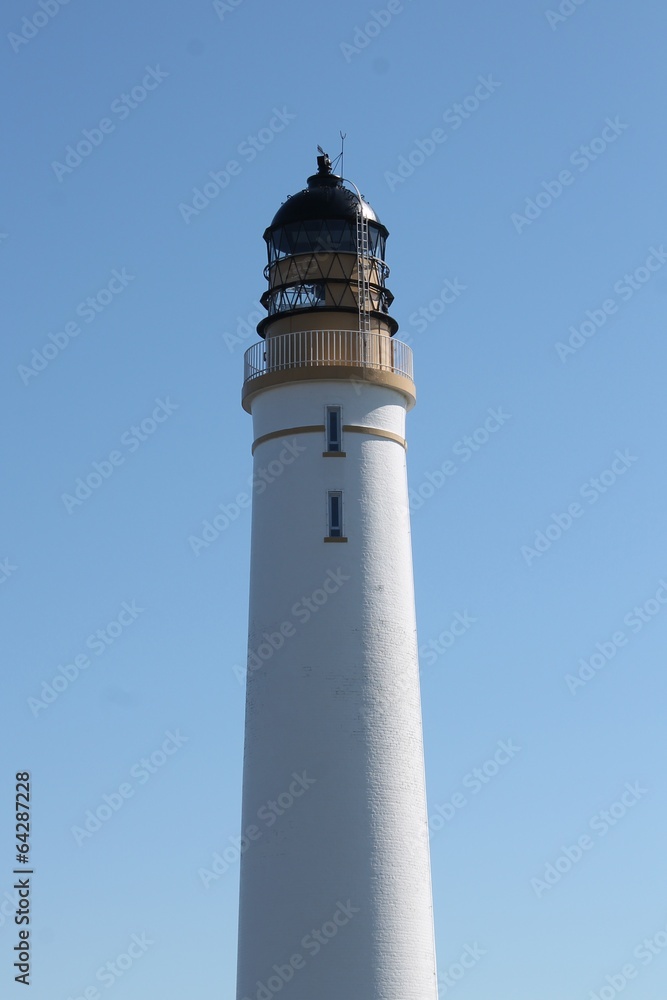 White-painted brick lighthouse tower