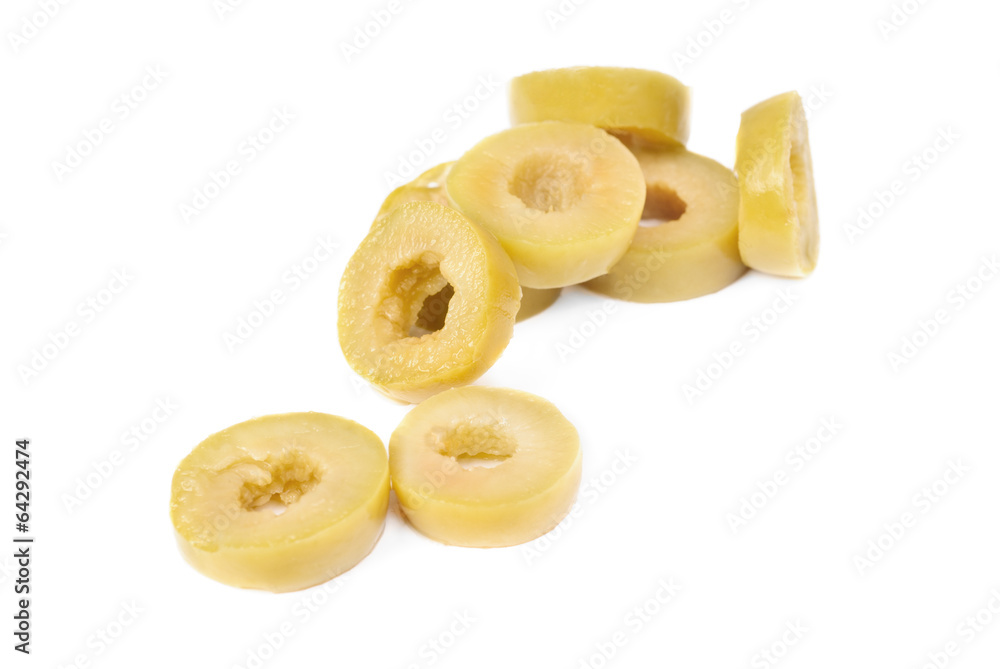 sliced green olives isolated on the white background sliced green olives isolated on the white background