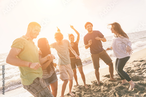 Multiracial Group of Friends Having a Party at Beach