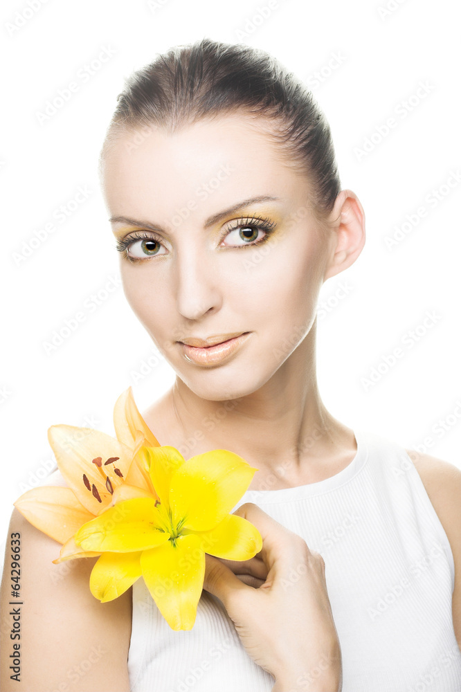 Young woman with yellow flowers Young woman with yellow flowers