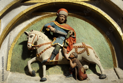 фотографія Saint Martin cuts his cloak for a beggar
