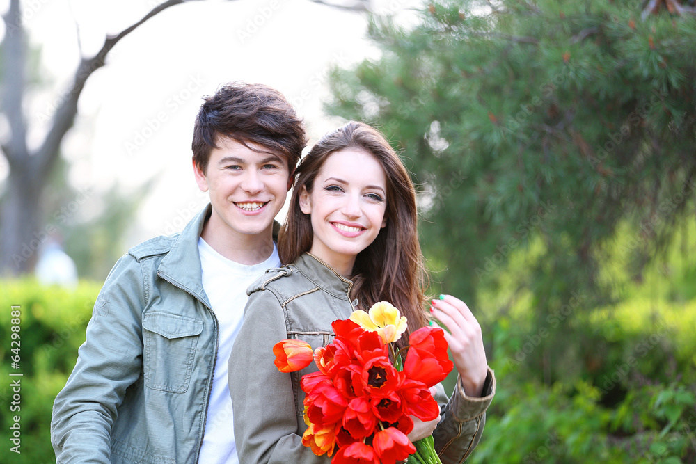 Beautiful young couple in park