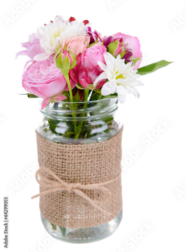 Fototapeta Naklejka Na Ścianę i Meble -  Beautiful bouquet of bright flowers in jar isolated on white