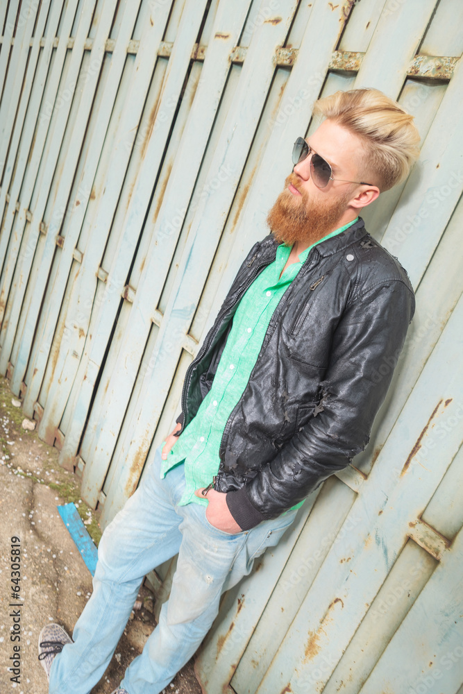young bearded man looks forward young bearded man looks forward