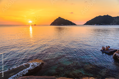 Tourism watching beautiful sea with sunset scene