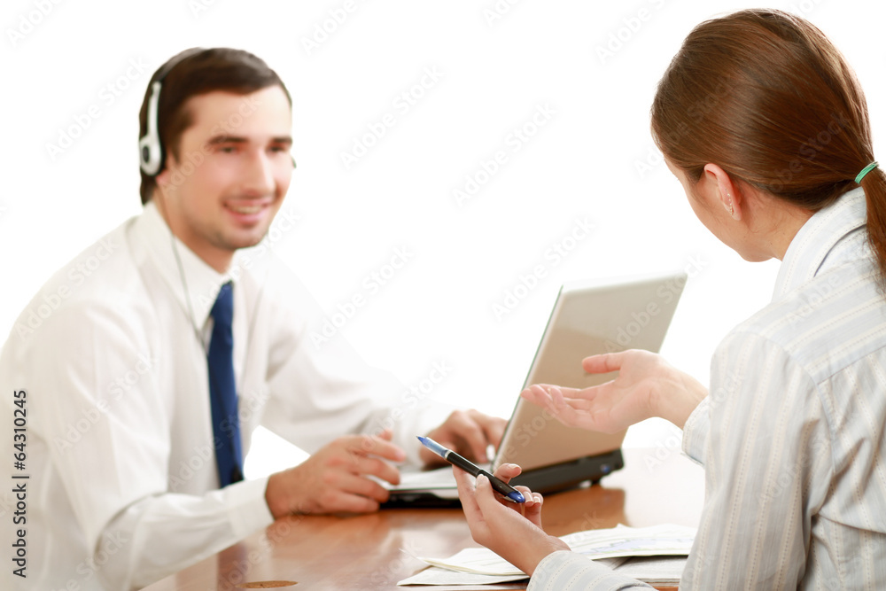A businessgroup working at the table A businessgroup working at the table