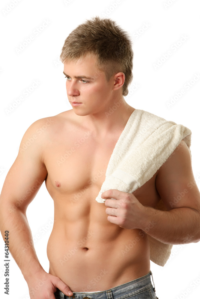 A muscular man holding a towel isolated on white background A muscular man holding a towel isolated on white background