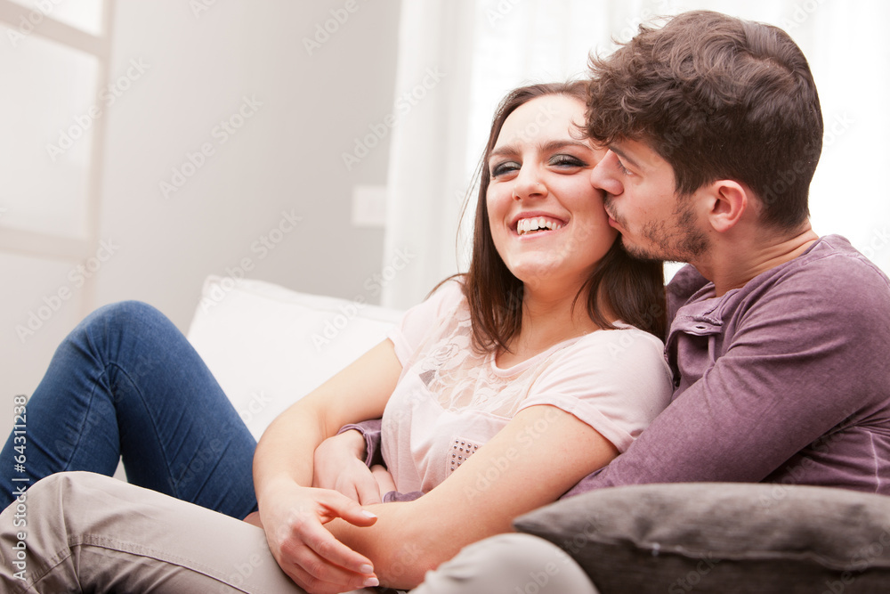 man kisses softly a happy woman man kisses softly a happy woman