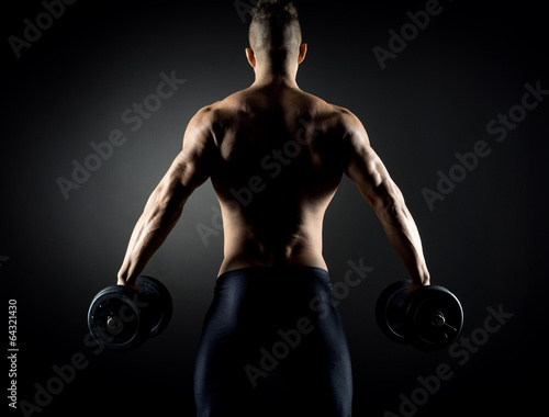 Muscular man weightlifting