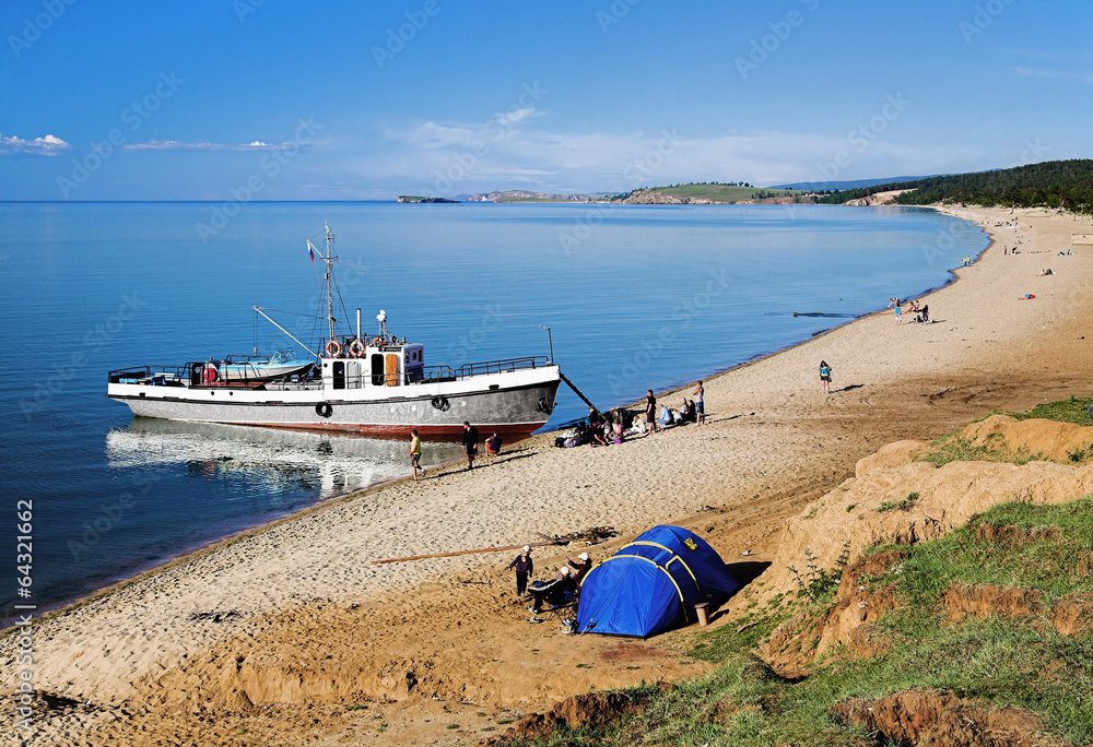 Fototapeta premium Ship at the shore of Olkhon island on Baikal lake
