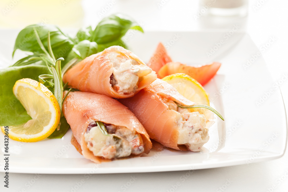 Smoked salmon roll with vegetable salad