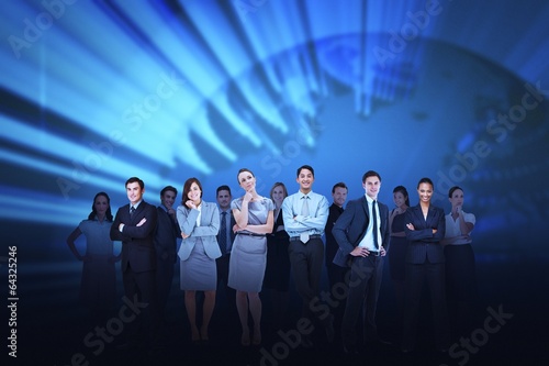 Business team against blue earth background