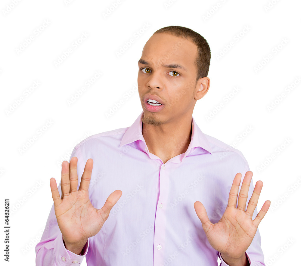 Stop hand gesture. Annoyed young man with hands up Stock Photo