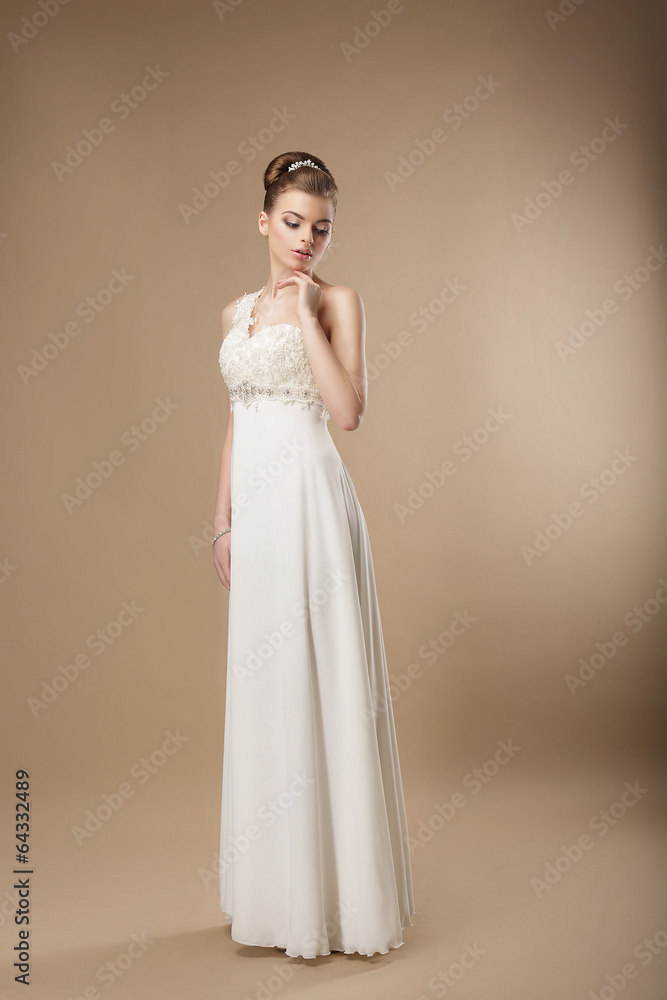 Gorgeous Shapely Woman in Long Smooth White Dress Gorgeous Shapely Woman in Long Smooth White Dress