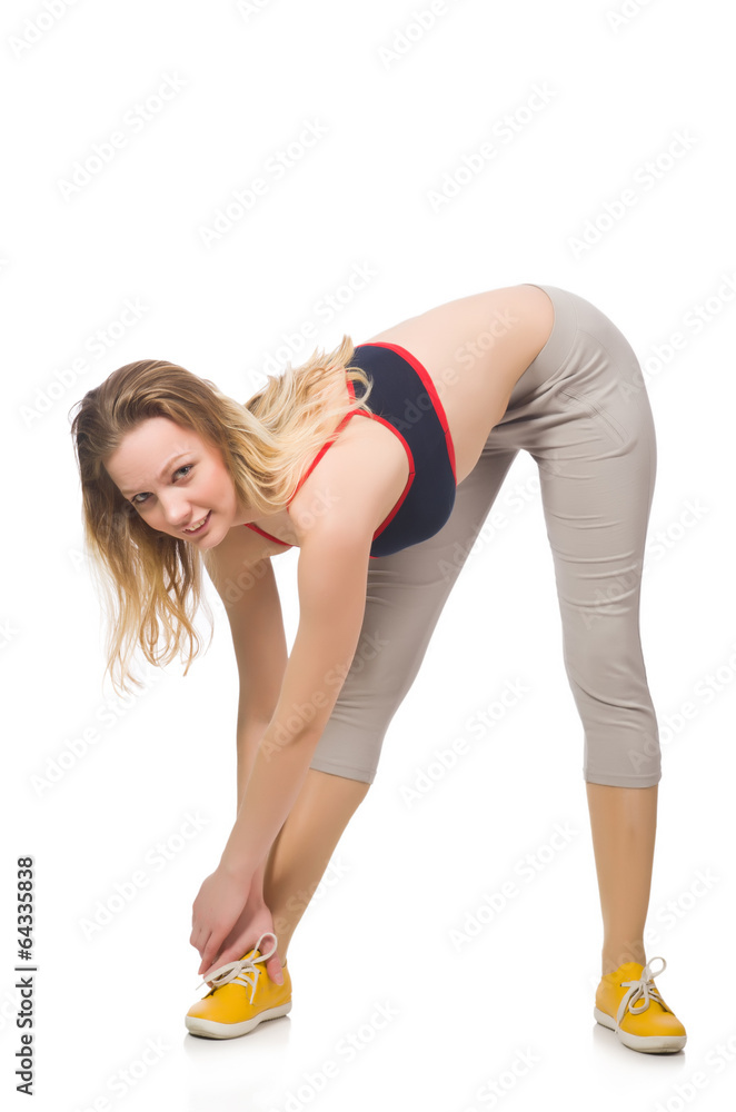 Young female doing exercises on white Young female doing exercises on white
