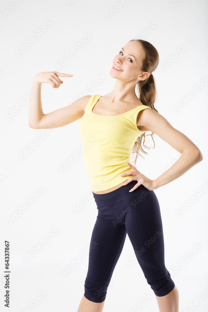 Beautiful Sexy slim athletic woman posing at studio