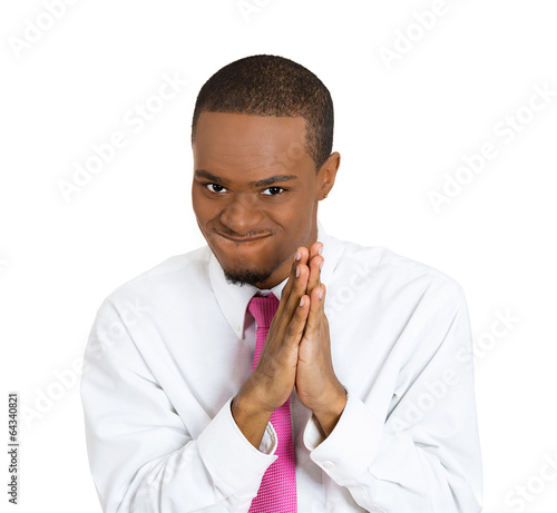 Portrait sly plotting young man isolated on white background  photo