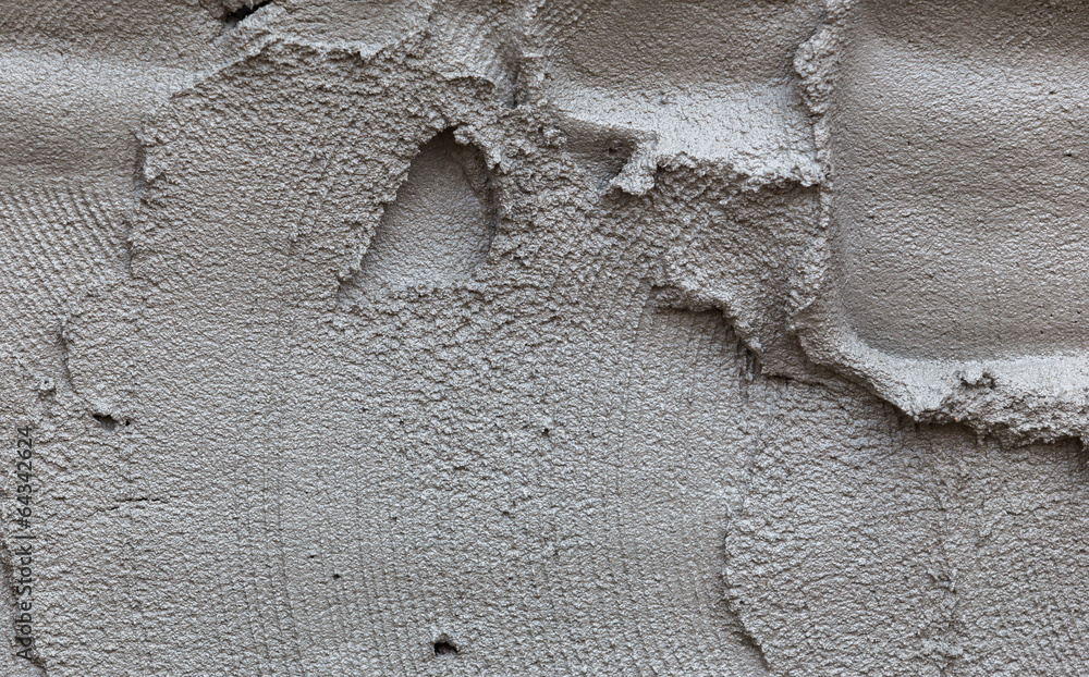 plasterer concrete on wall of house construction
