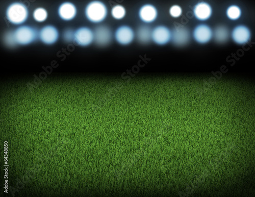 Night football arena illuminated by spotlights © cherezoff