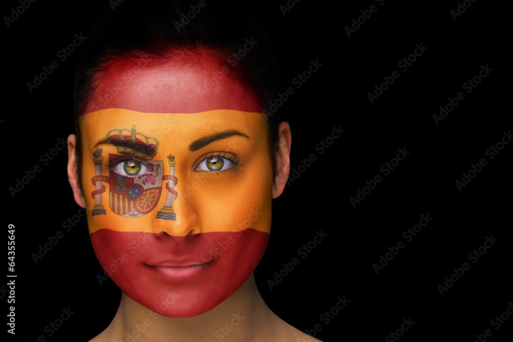 Composite image of spanish football fan in face paint Composite image of spanish football fan in face paint
