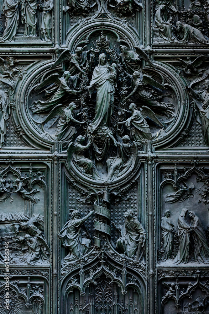 Duomo cathedral of Milan - entrance door detail Duomo cathedral of Milan - entrance door detail
