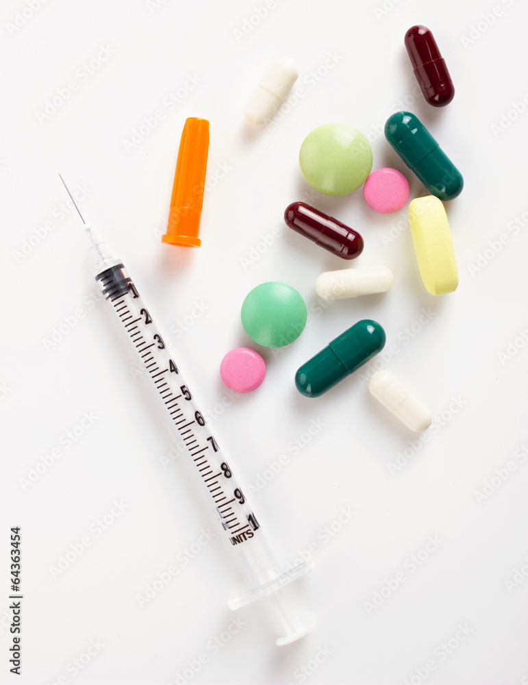 insulin syringe and colorful medicaments insulin syringe and colorful medicaments