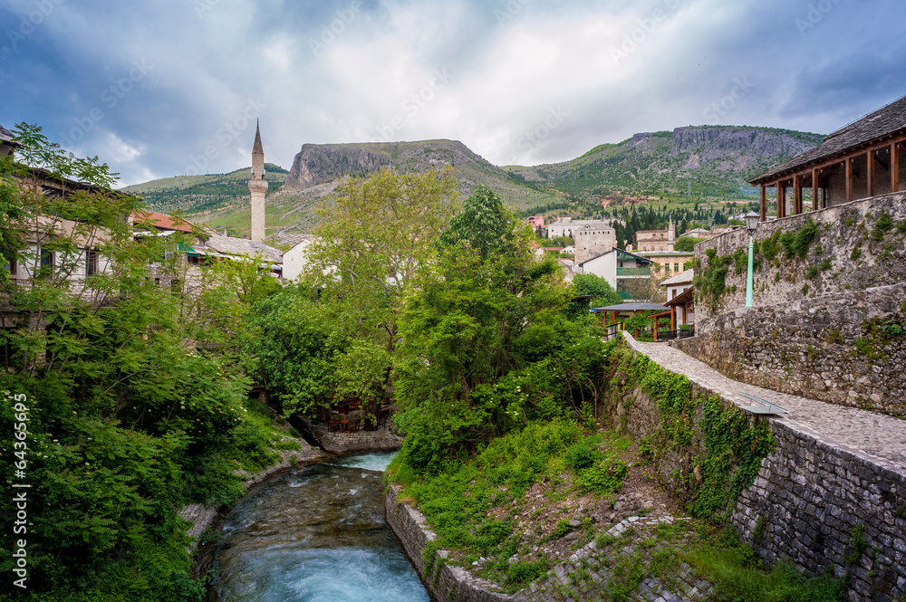 Old town of Mostar. Islamic architecture with river running