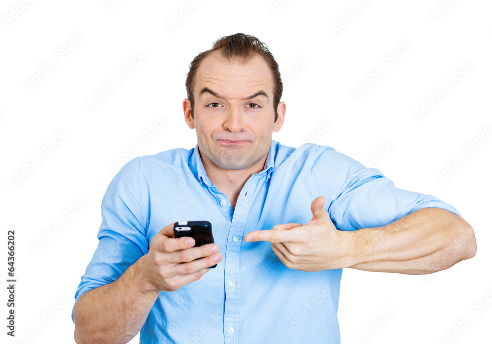 Bad text message. Upset business man holding smart phone Bad text message. Upset business man holding smart phone