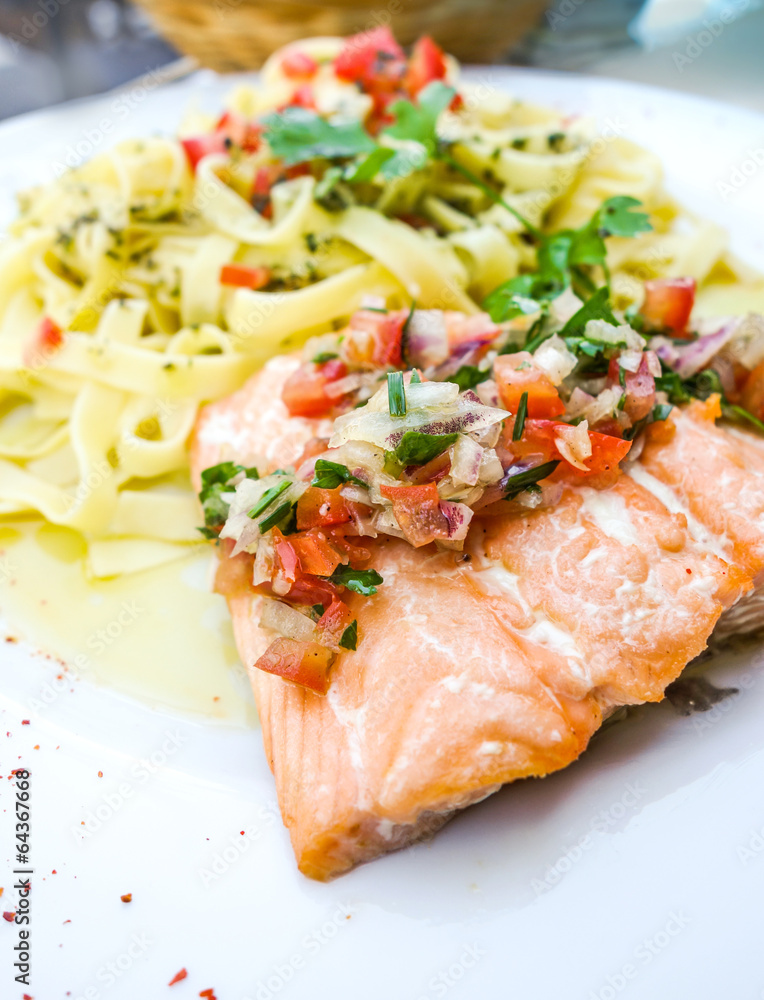 plate of pasta and smoked salmon with tomato plate of pasta and smoked salmon with tomato