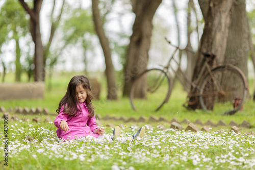 Little girl at the spring f...