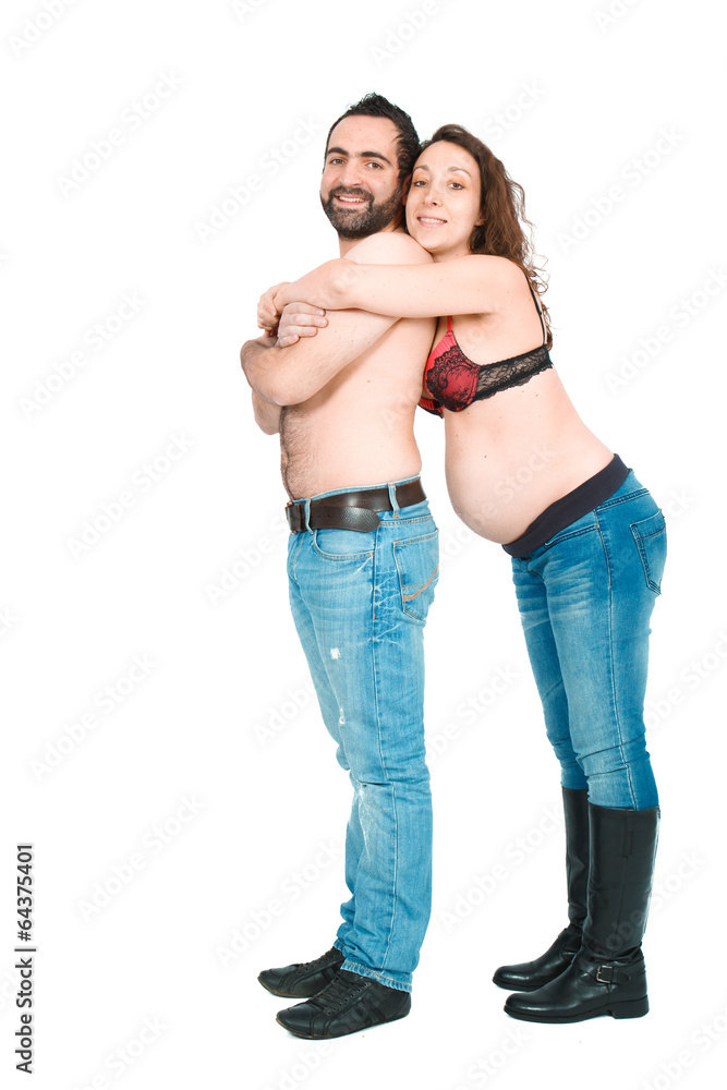 Man posing with his pregnant wife Man posing with his pregnant wife