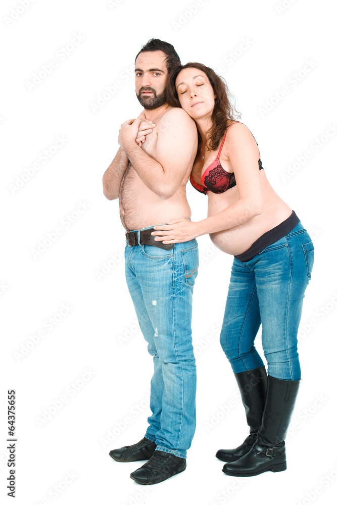 Man posing with his pregnant wife Man posing with his pregnant wife