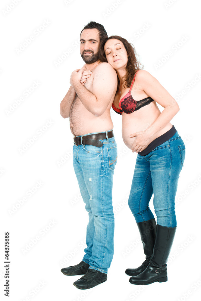 Man posing with his pregnant wife Man posing with his pregnant wife