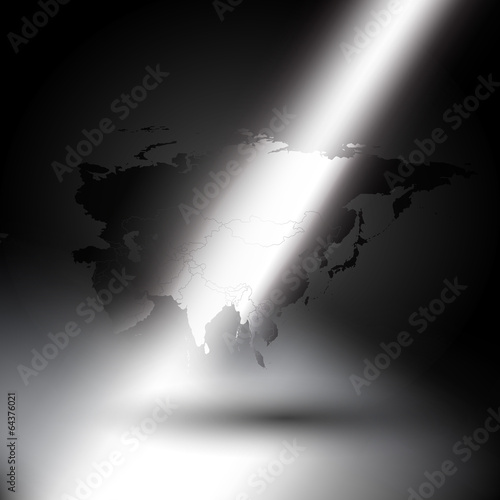Eurasia map in rays of light on gray background