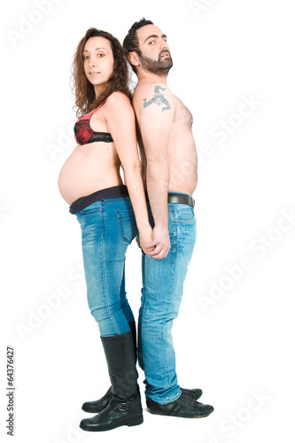 Man posing with his pregnant wife