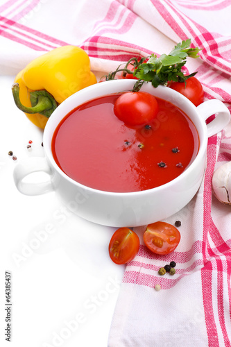 Tasty tomato soup and vegetables, isolated on white