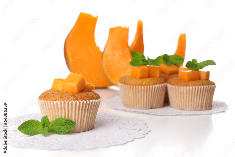 Tasty pumpkin muffins, isolated on white Tasty pumpkin muffins, isolated on white