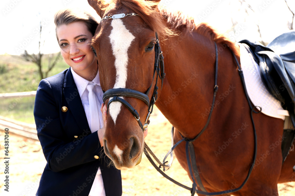 Obraz premium Beautiful girl with horse outdoors