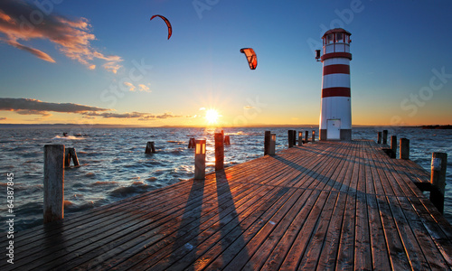 Canvas Print Lighthouse at Lake Neusiedl at sunset