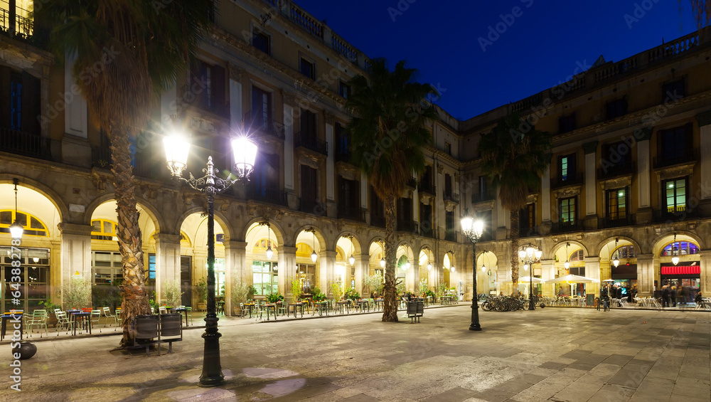 night view of Placa Reial in  Barcelona, Spain