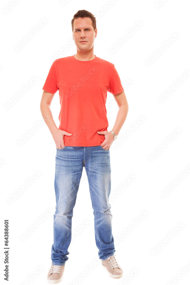 Young man guy red t-shirt jaens with hands in pockets isolated Young man guy red t-shirt jaens with hands in pockets isolated