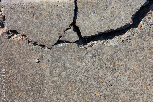 Fotografie Cracked concrete surface