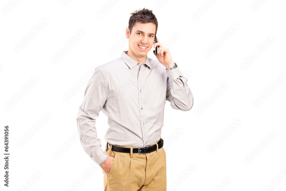 Young man talking on the phone Young man talking on the phone