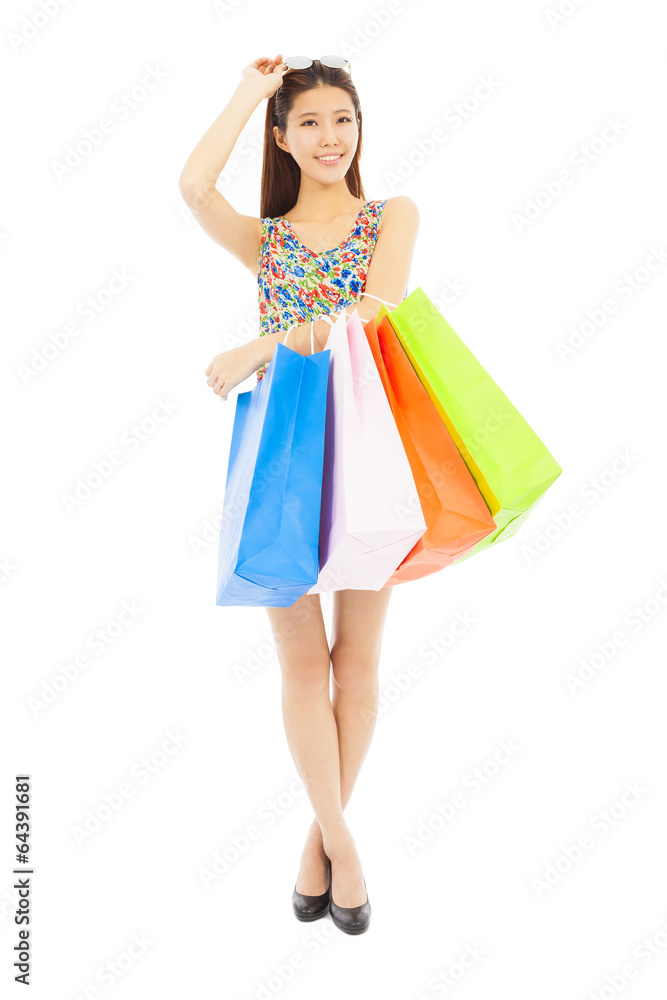 happy young woman holding shopping bags happy young woman holding shopping bags