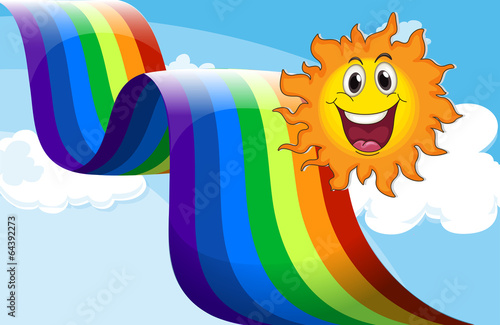A cheerful sun near the rainbow