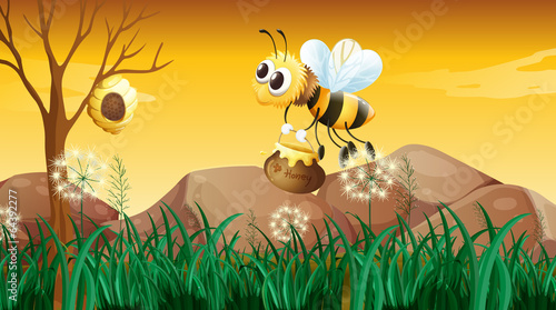 A bee flying going to the beehive