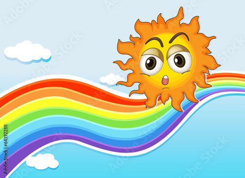 A sky with a sun and a rainbow