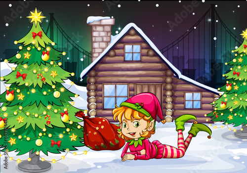 A female Santa elf near the christmas tree